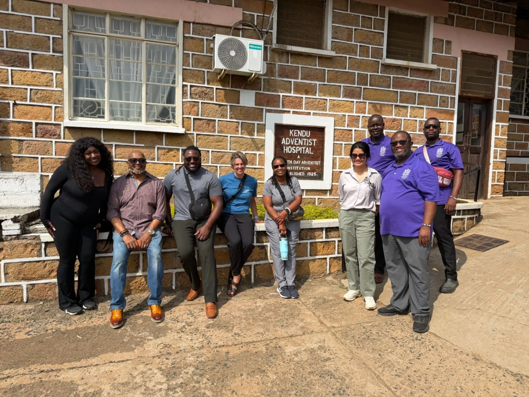 Mental health professionals standing outside Kendu Adventist Hospital in Kenya